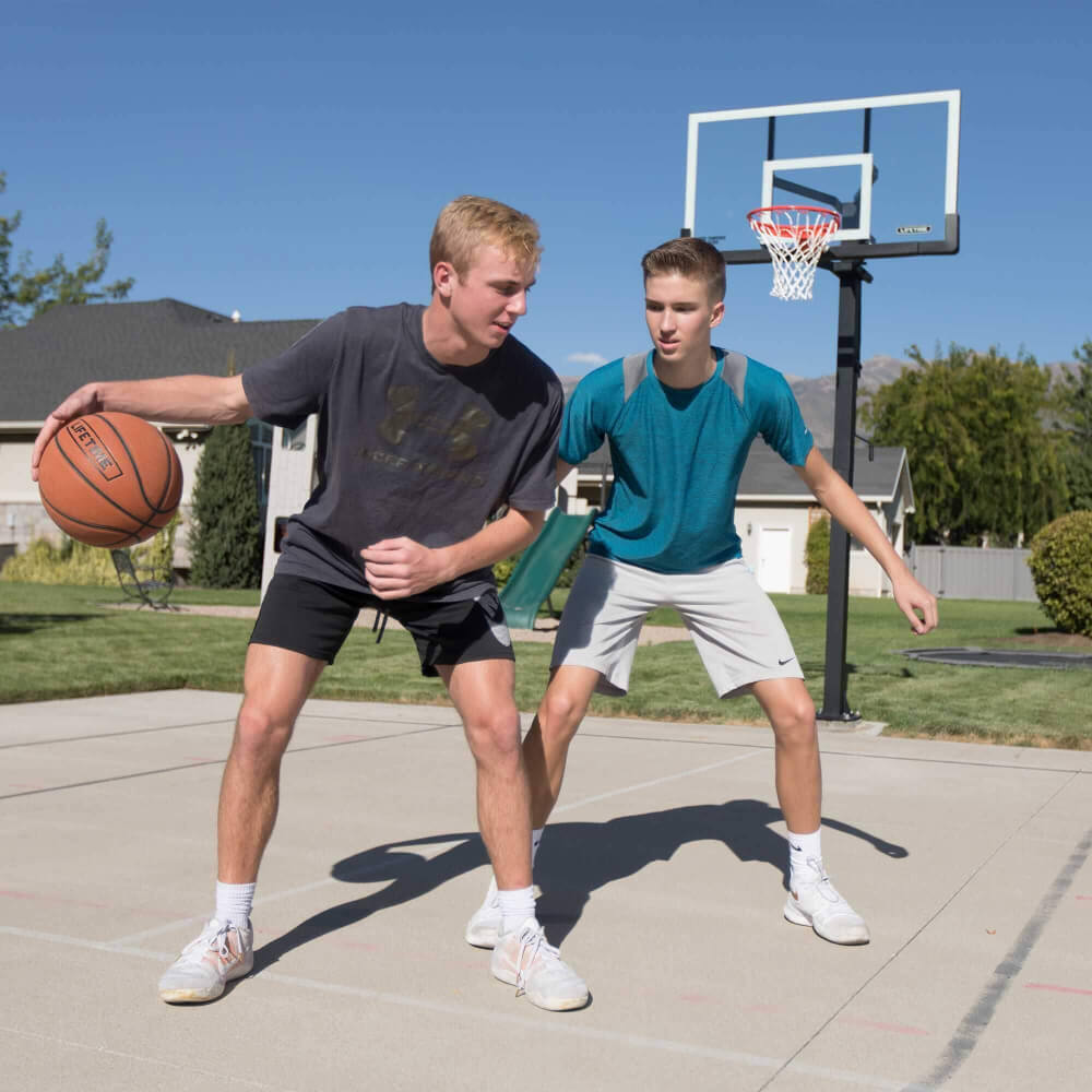 Lifetime Adjustable Bolt Down Basketball Hoop (60-Inch Tempered Glass)