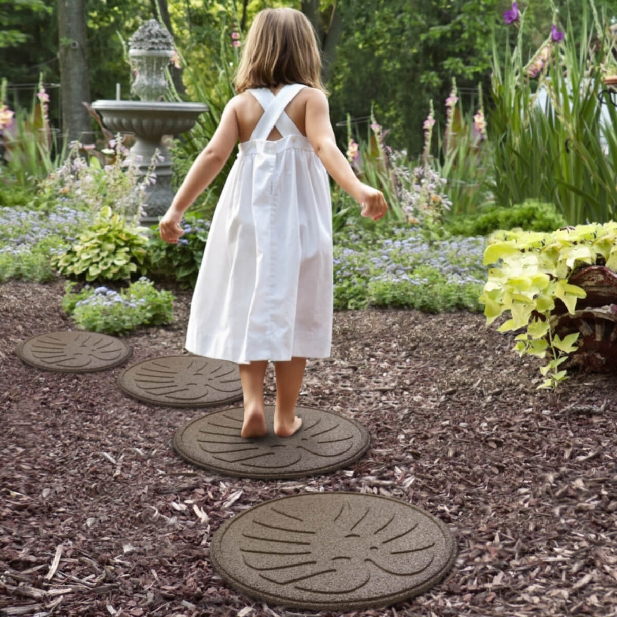 Garden Central 18" x 18" Tropical Leaf Round Stepping Stones in Brown, 4-pack, Made with recycled materials